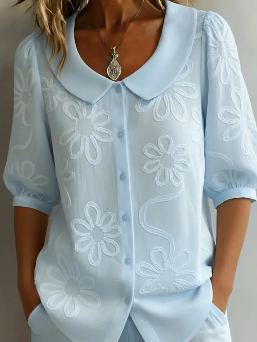 Vintage shirt with a stand-up collar and embroidered flowers