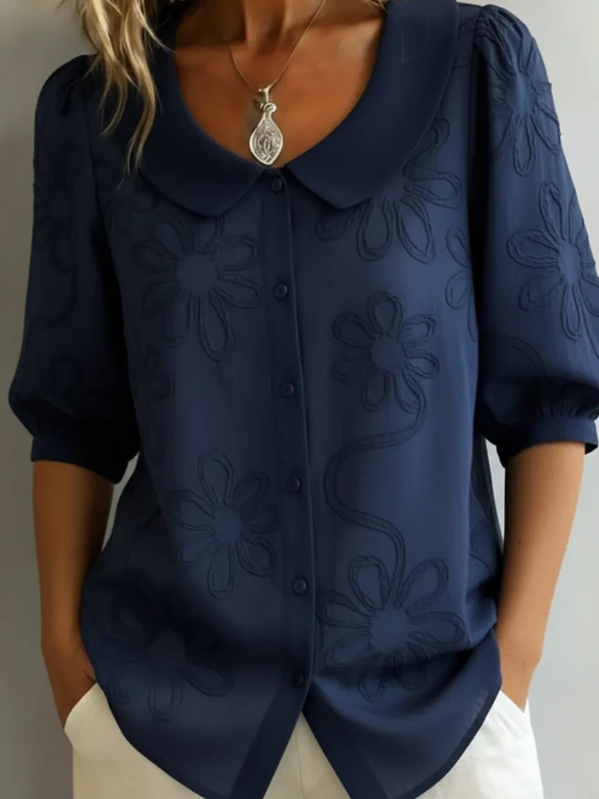 Vintage shirt with a stand-up collar and embroidered flowers
