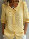 Vintage shirt with a stand-up collar and embroidered flowers
