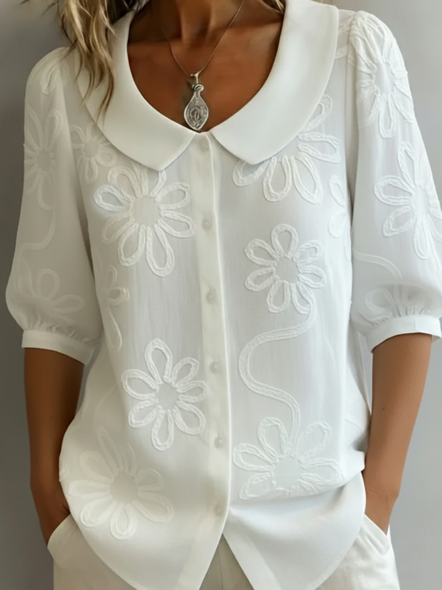 Vintage shirt with a stand-up collar and embroidered flowers